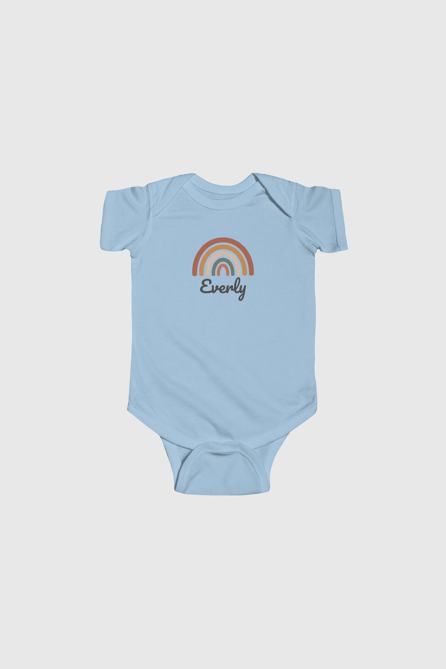Yellow personalized rainbow baby bodysuit with custom name, snap closure