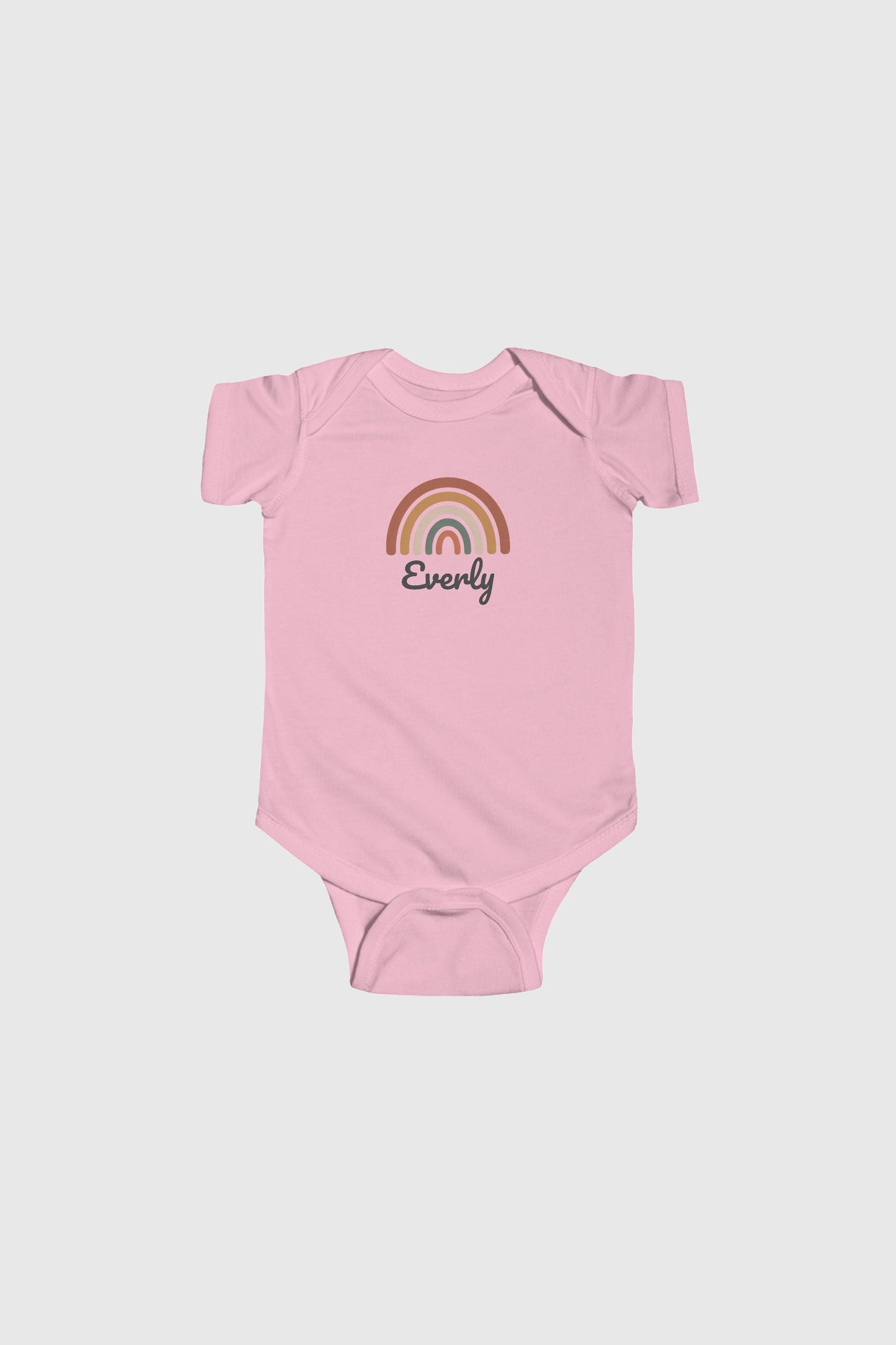 Baby wearing light blue personalized rainbow bodysuit