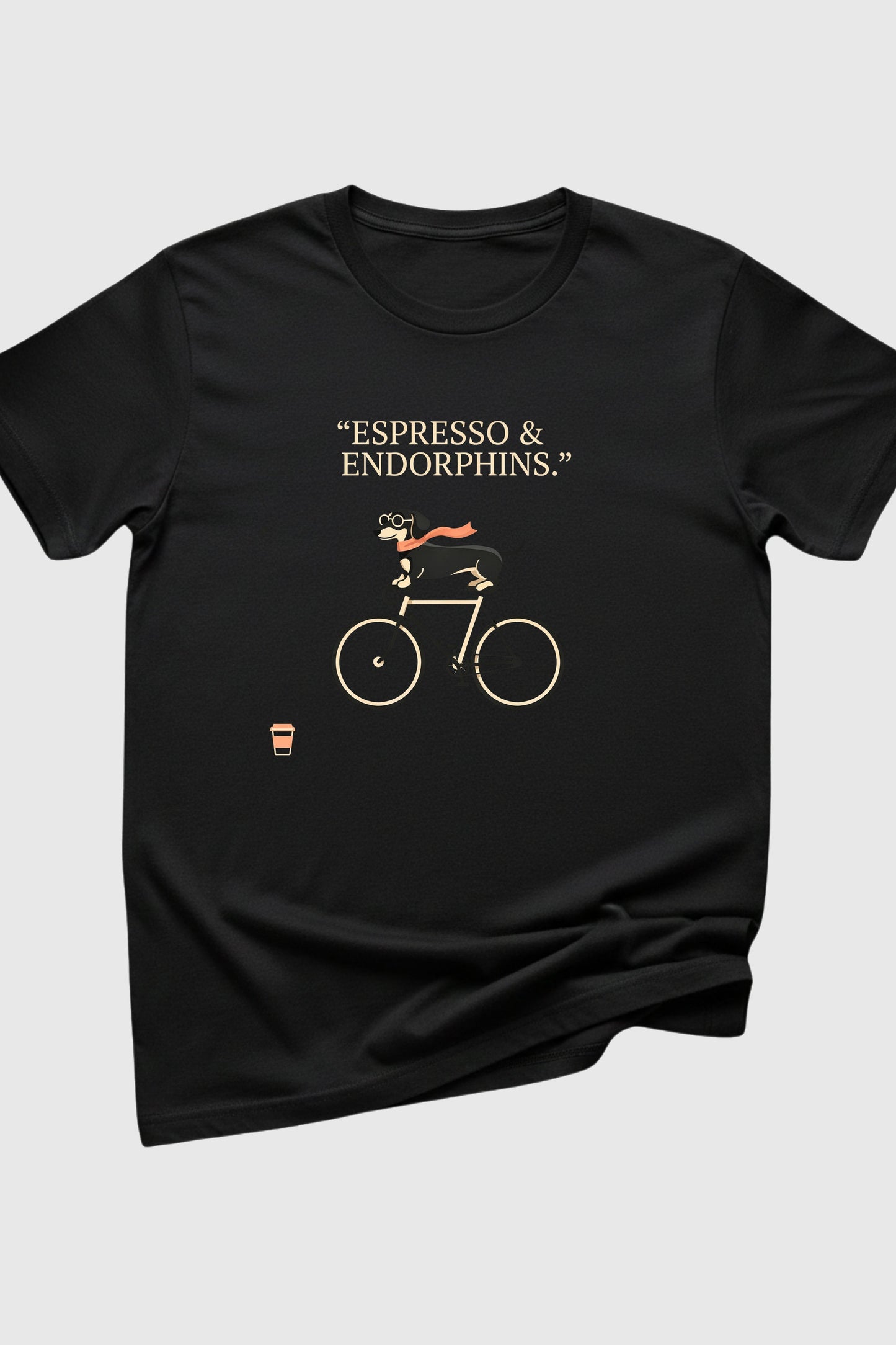 Dachshund on bicycle coffee print close-up on white t-shirt