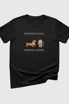 Black t-shirt with a dachshund and coffee graphic and text on a light gray background