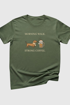 Green t-shirt with a dachshund and coffee cup graphic and text on a white background