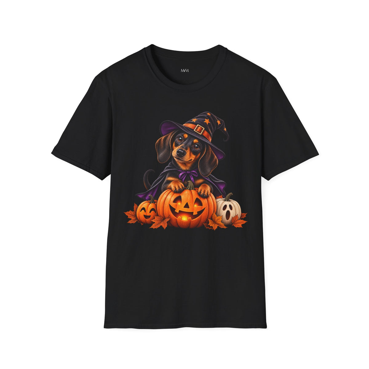 A black short-sleeve crewneck t-shirt featuring a colorful graphic of a dachshund dressed as a witch sitting on jack-o'-lanterns, displayed against a solid white background.
