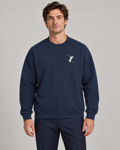 Man wearing Swing dachshund golf sweatshirt, front studio view. Color: Navy