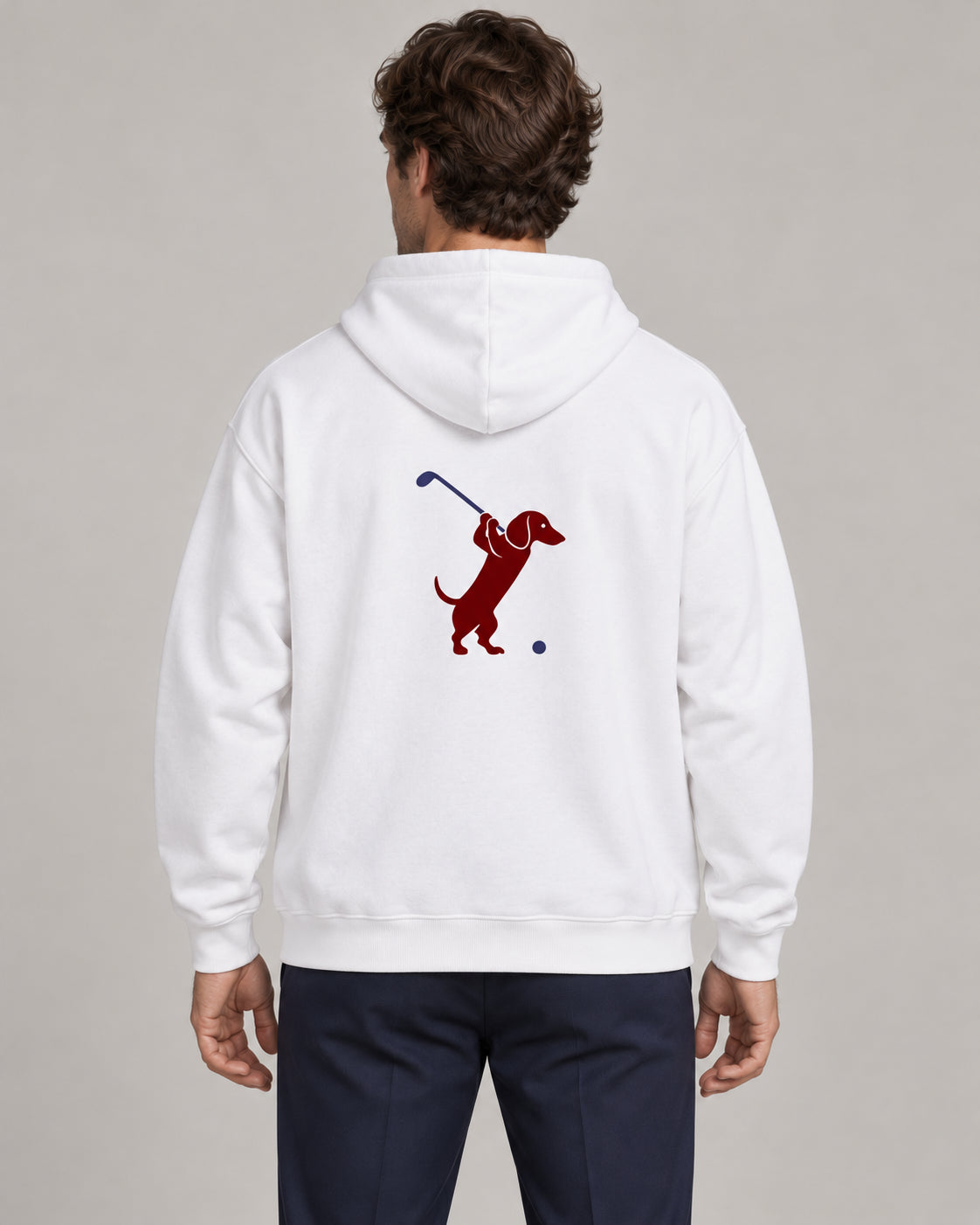 Man wearing Club & Swing dachshund golf hoodie, back studio view. Color: White