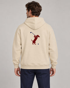Man wearing Club & Swing dachshund golf hoodie, back studio view. Color: Apricot