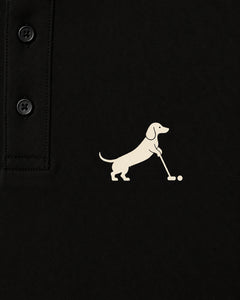 Putting dachshund golf polo, chest logo detail. Color: Black