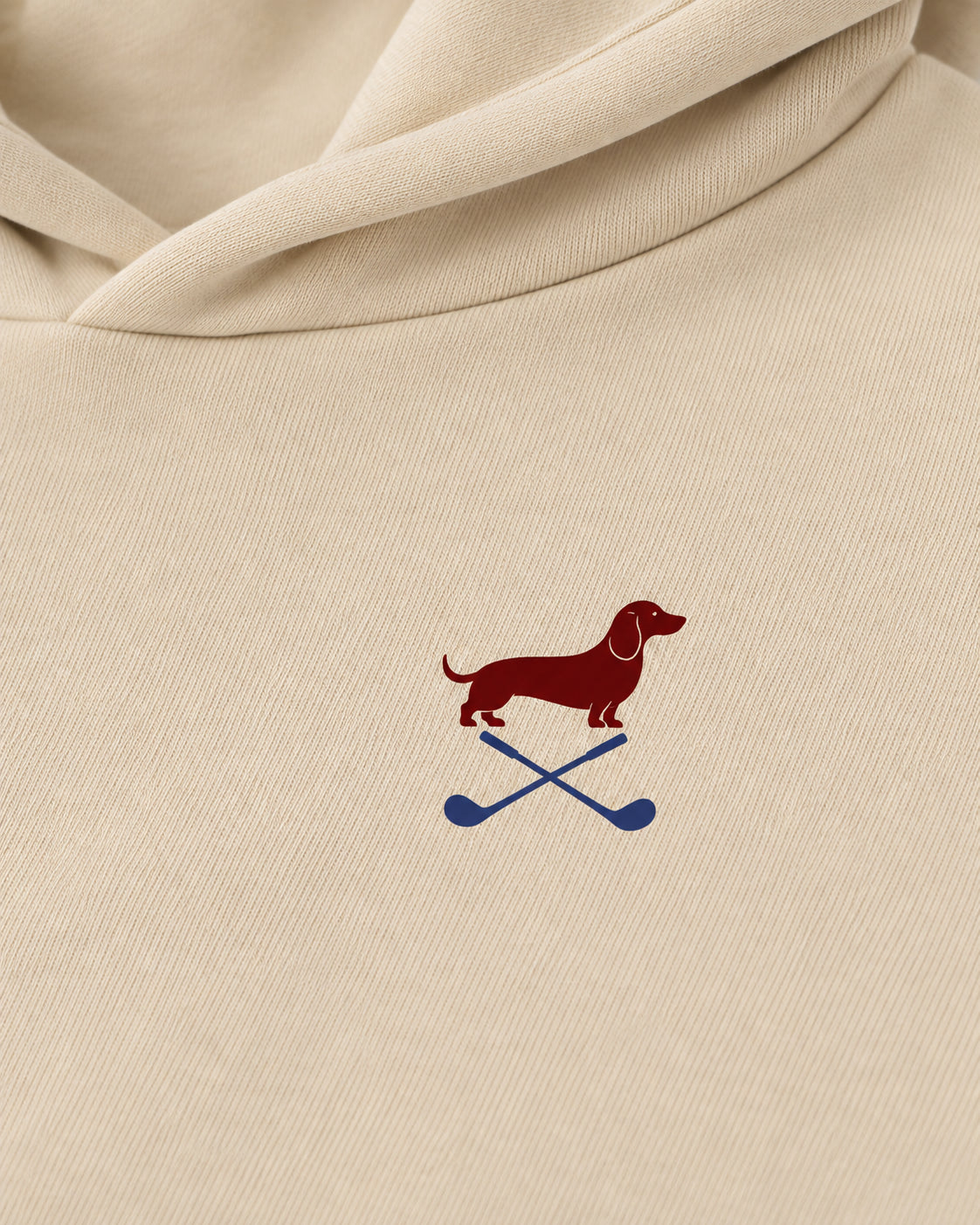 Club & Swing dachshund golf hoodie print detail. Color: Apricot