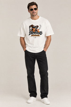 Man in aviator sunglasses wearing the Bad Decisions Dachshund Tee in white with black jeans. Color: White