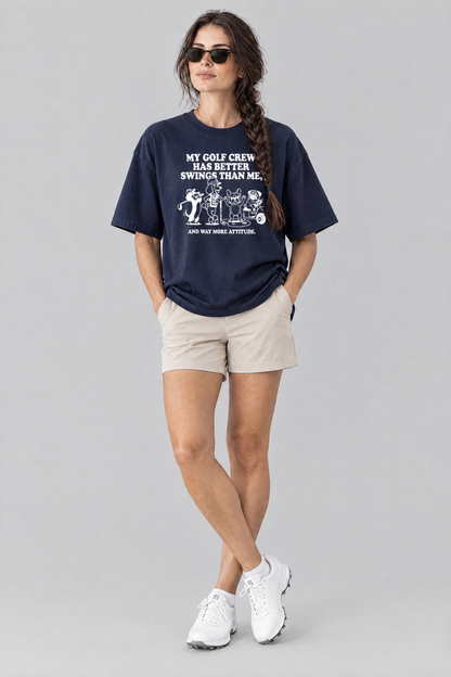Woman wearing the Better Swings Dog Golf Tee in navy with beige golf shorts and sunglasses. Color: Navy