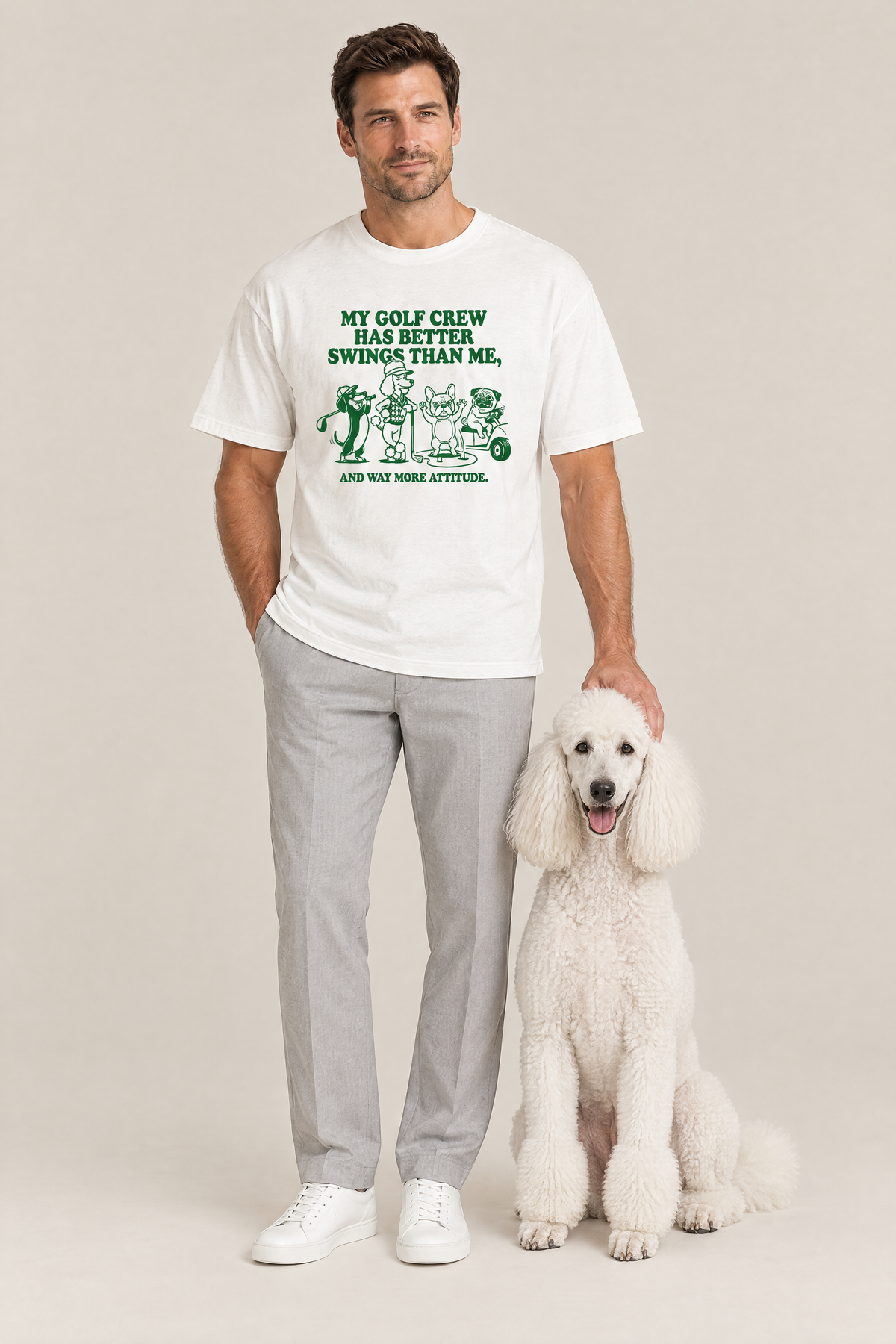 Man wearing the Better Swings Dog Golf Tee in white with a white standard poodle. Color: White