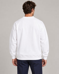 Man wearing Swing dachshund golf sweatshirt, back studio view. Color: White