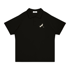 Putting dachshund golf polo, front flatlay. Color: Black