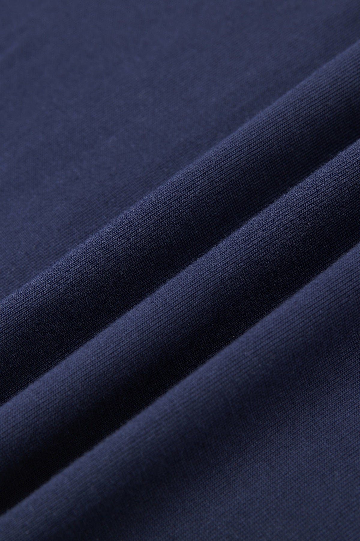 Navy 260 gsm heavyweight cotton fabric, close-up