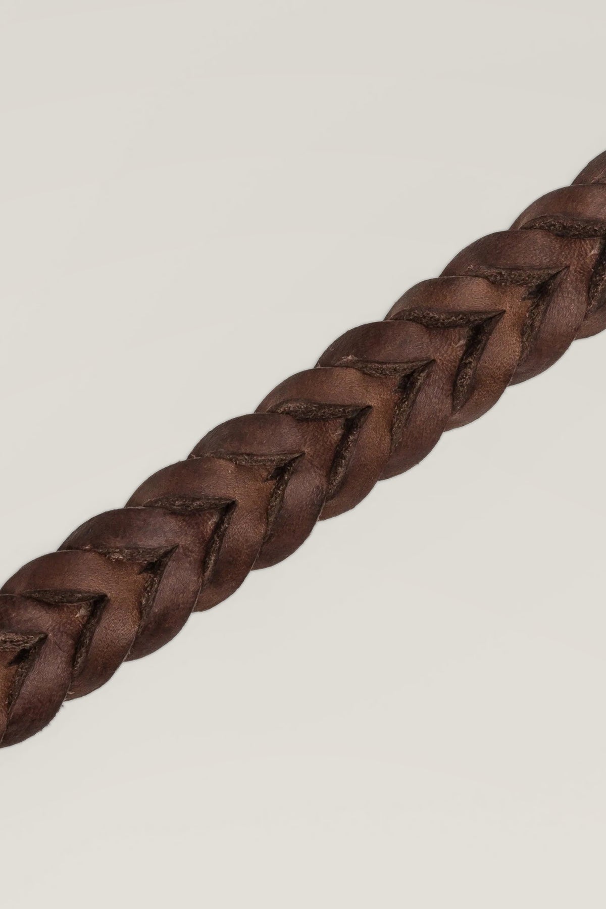 Hand-braided brown greased leather of the Cloud 7 Central Park dog collar, close-up