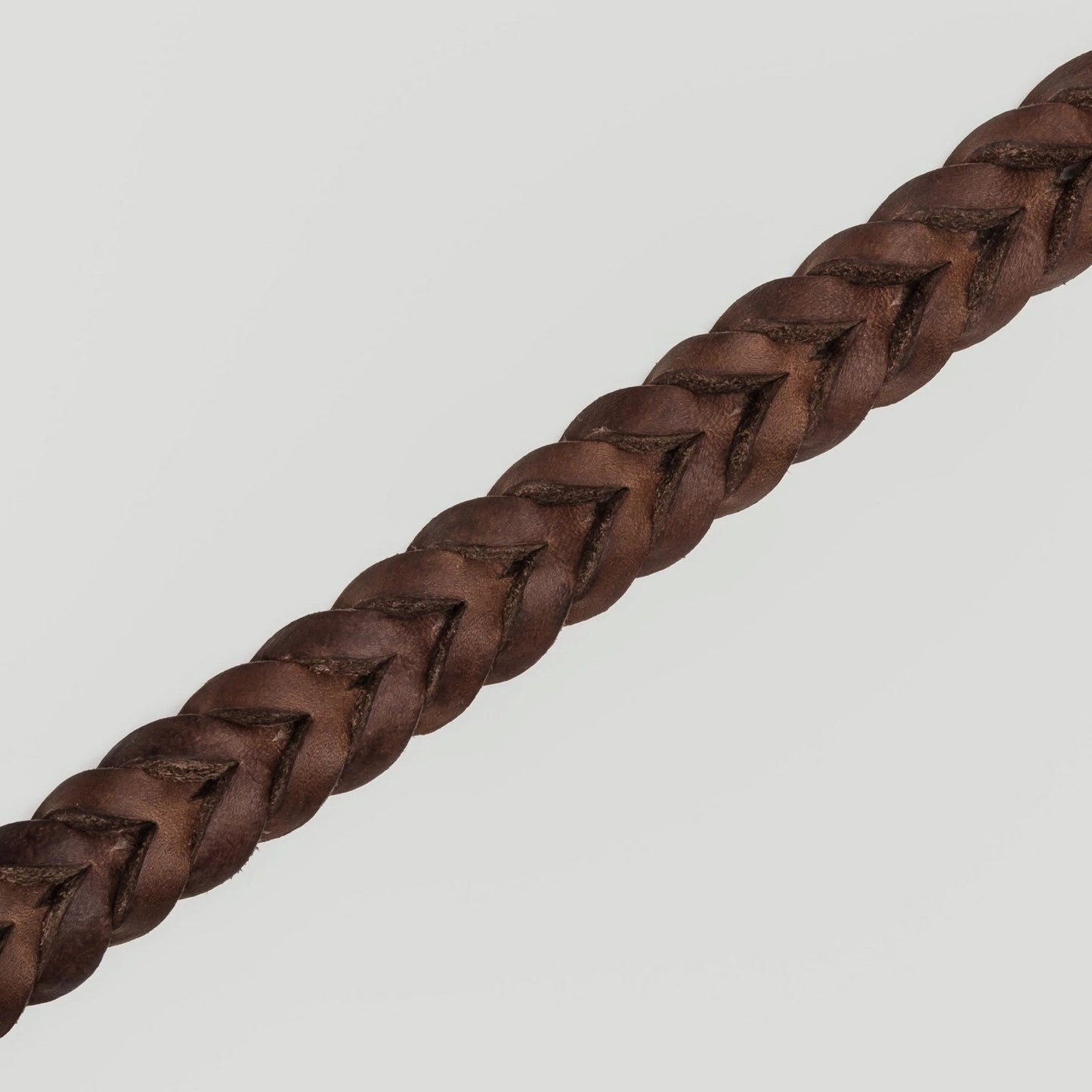 Brown leather dog collar side view, adjustable strap