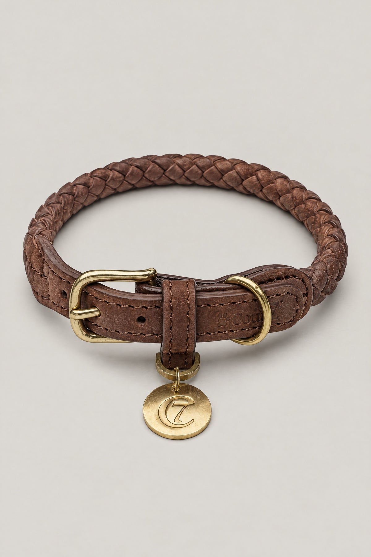 Chocolate brown braided nubuck Cloud 7 Ravello dog collar with brass buckle and logo coin, front view