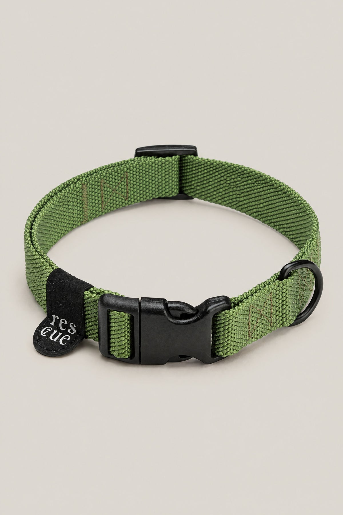 Green nylon Cloud 7 RESC7UE dog collar with black plastic buckle and rescue tag, front view