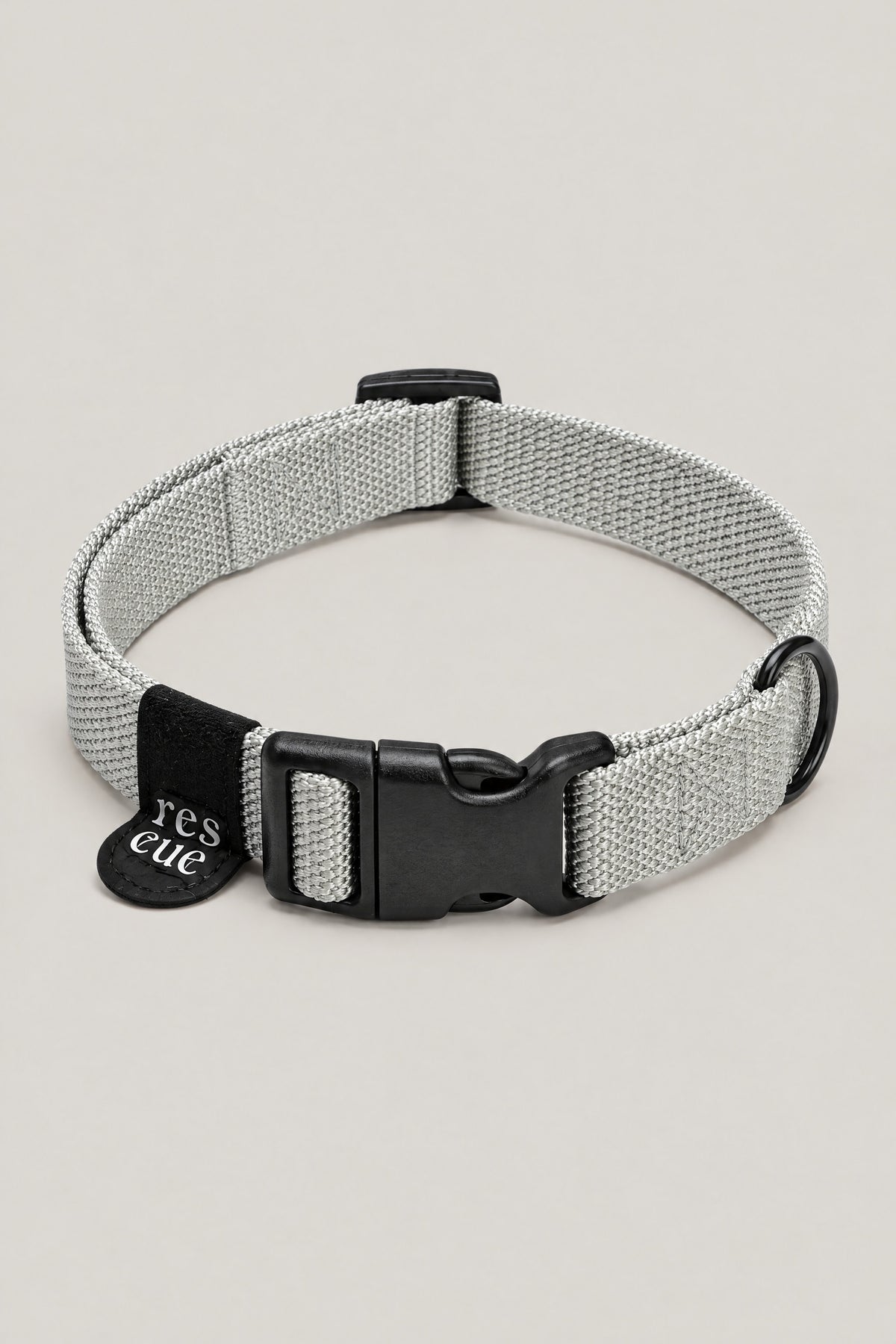 Silver grey nylon Cloud 7 RESC7UE dog collar with black plastic buckle and rescue tag, front view