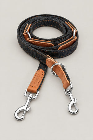 Black canvas and cognac leather Cloud 7 Tivoli dog leash with stainless steel snap hooks, coiled front view