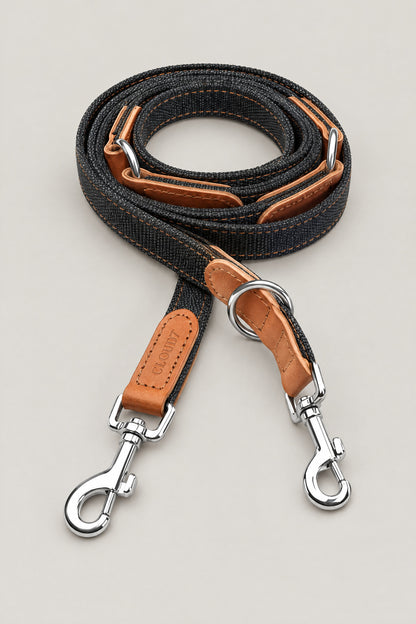 Black canvas and cognac leather Cloud 7 Tivoli dog leash with stainless steel snap hooks, coiled front view