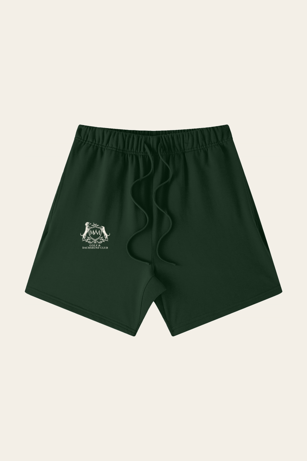 Flat lay of blackish green Club Crest shorts with the small cream Golf & Dachshund Club crest on the leg, front view. Color: Blackish Green