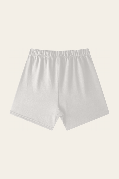Flat lay of oat gray Club Crest shorts, back view. Color: Oat Gray