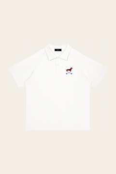 White Club Mark dachshund golf polo laid flat, front view on warm off-white background. Color: White