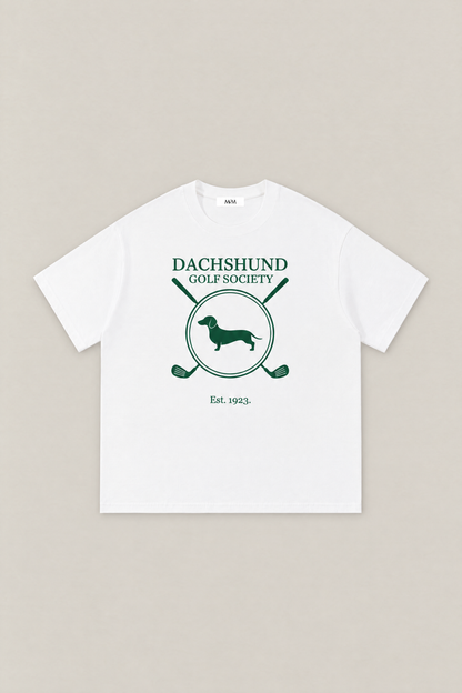 Dachshund Golf Society Tee in white, flat lay front view. Color: White