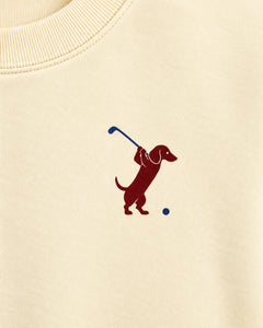 Swing dachshund golf sweatshirt print detail. Color: Apricot