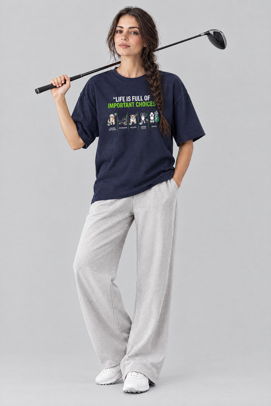 Woman wearing the Full of Choices Dog Golf Tee in navy with light grey trousers and a driver on her shoulder. Color: Navy