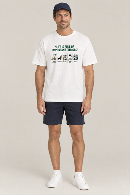 Man wearing the Full of Choices Dog Golf Tee in white with navy golf shorts and a navy cap. Color: White