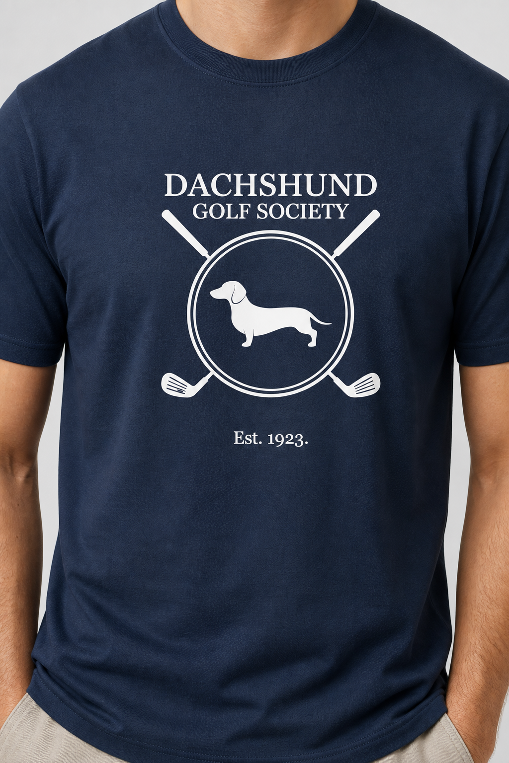 Man wearing white dachshund golf society t-shirt