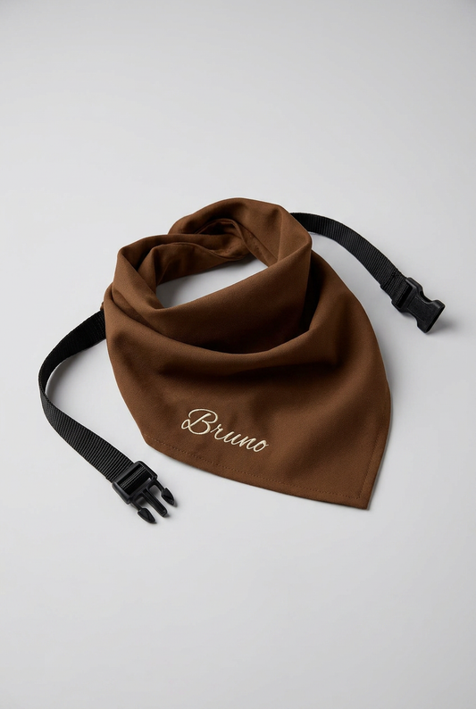 Brown personalized dog bandana with custom name print, adjustable neck strap