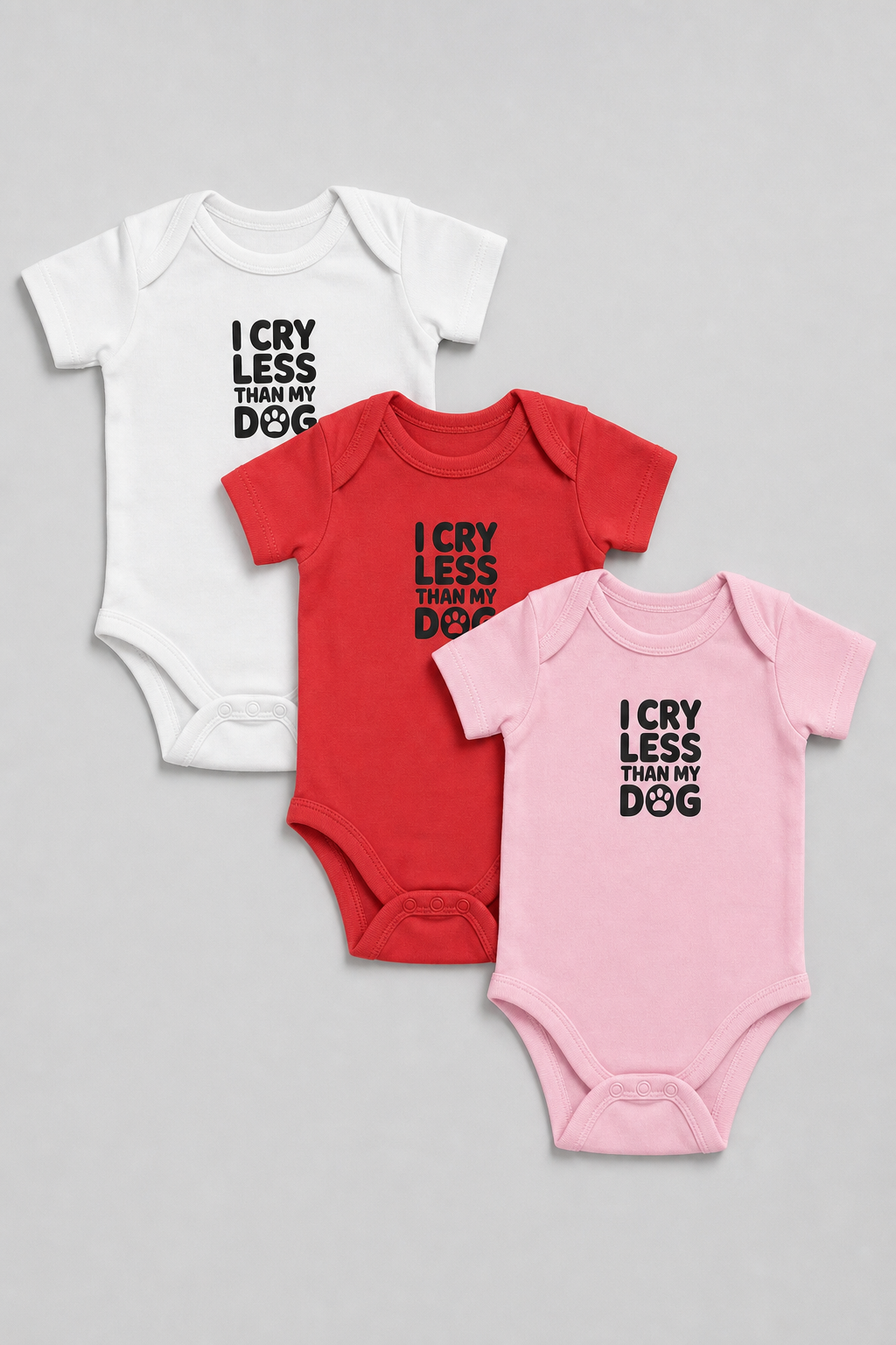 Pink baby bodysuit with I Cry Less Than My Dog print, snap closure