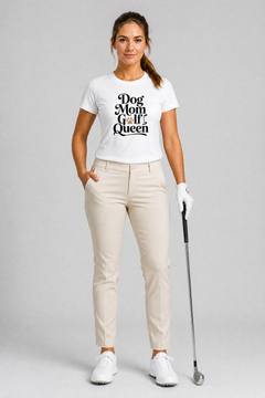 Woman in golf attire with a 'Dog Mom Golf Queen' t-shirt on a gray background