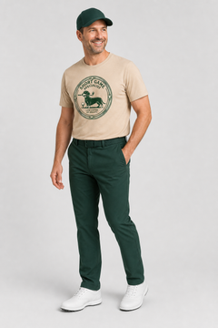 Woman wearing white short game specialist dachshund golf tee
