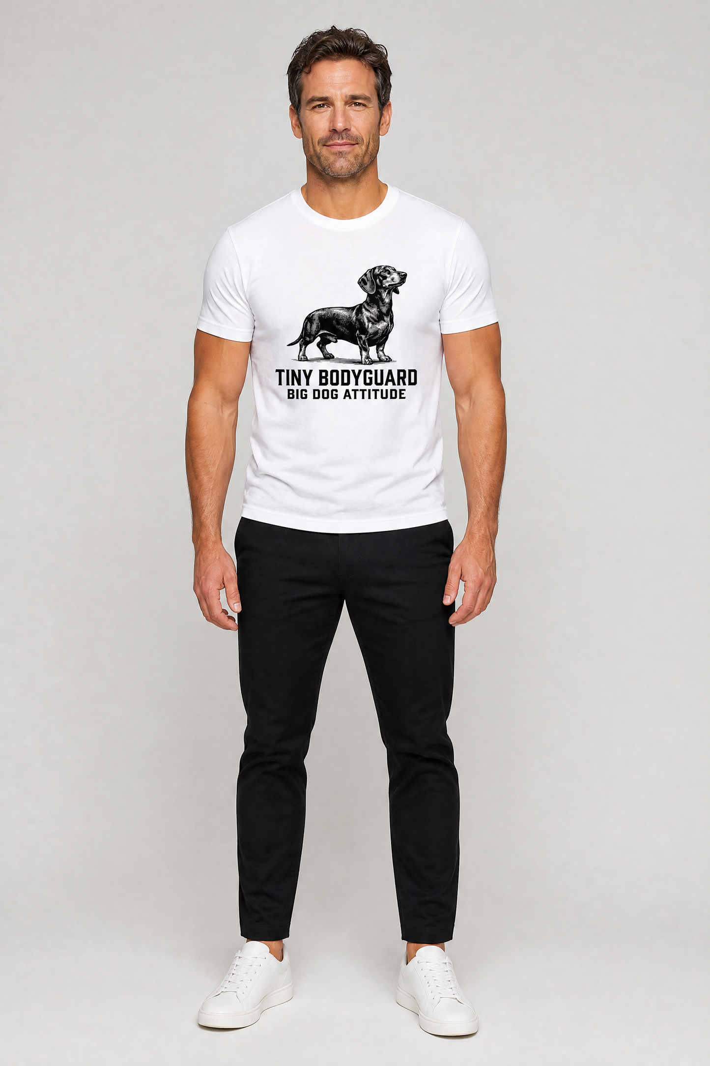 White t-shirt with Tiny Bodyguard Big Dog Attitude dachshund print, unisex crew neck