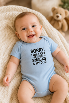 White baby bodysuit with Sorry I Only Cry For Snacks and My Dog print, snap closure
