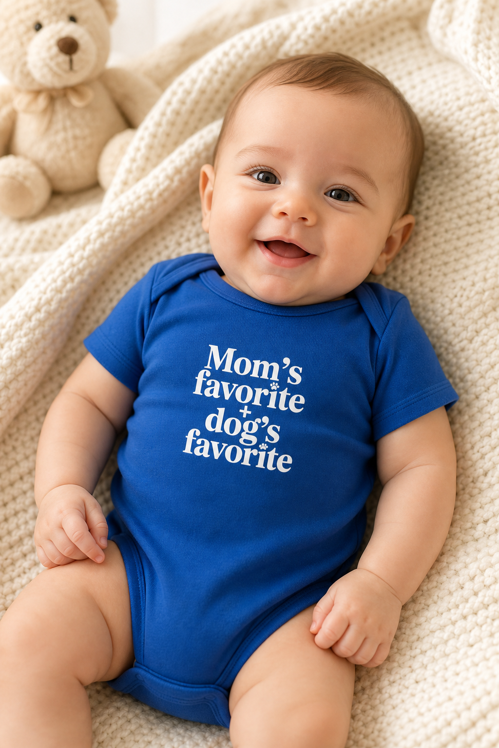 White baby bodysuit with Mom's Favorite Dog's Favorite print, snap closure