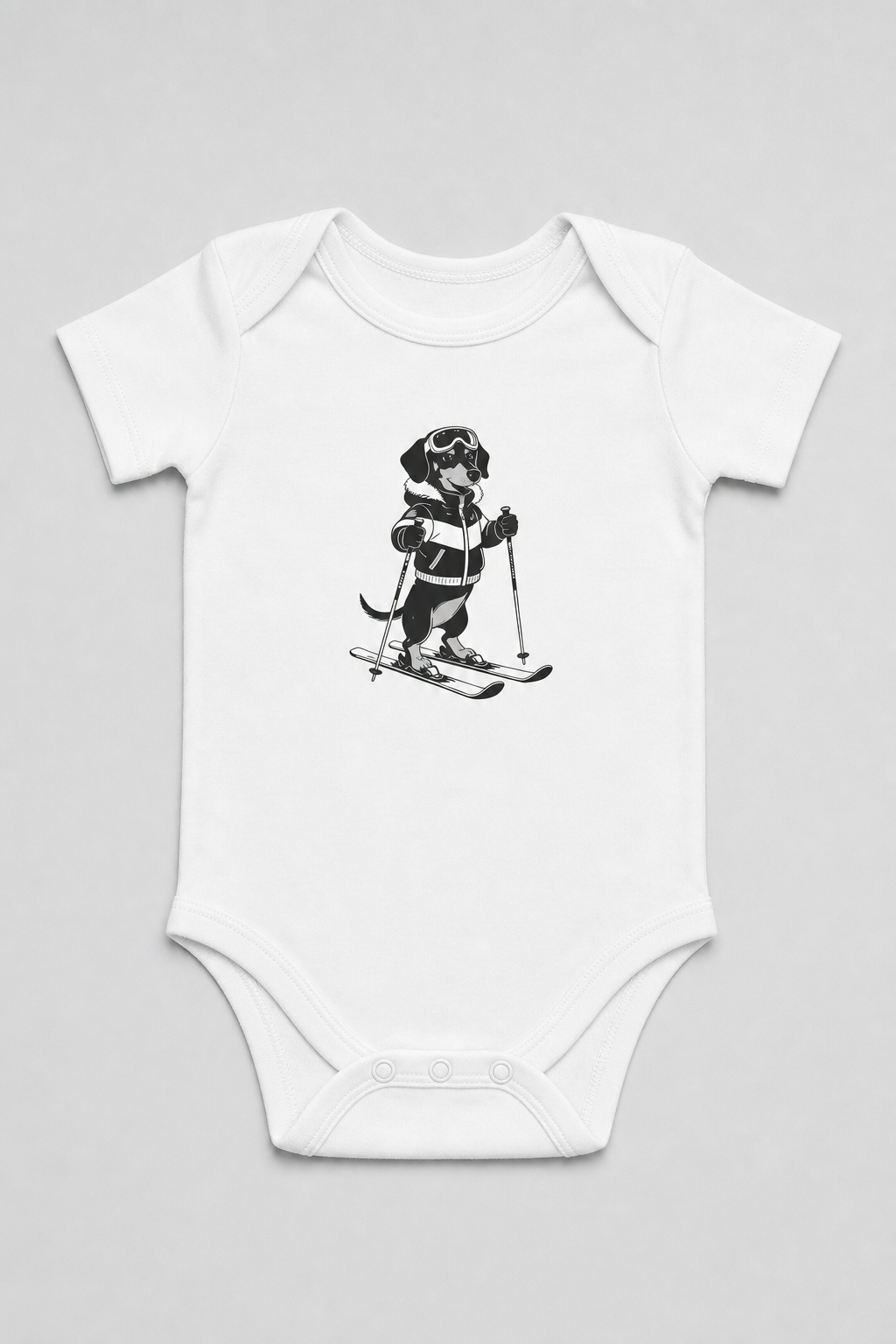 Pink baby bodysuit with cute skiing black labrador print, snap closure