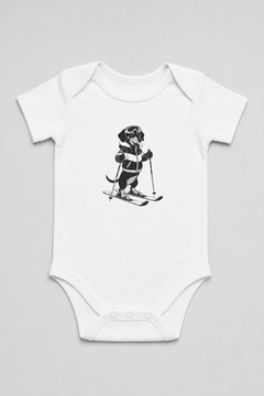 Pink baby bodysuit with cute skiing black labrador print, snap closure
