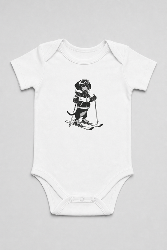 Pink baby bodysuit with cute skiing black labrador print, snap closure
