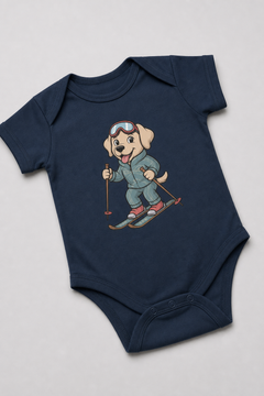 Baby wearing white skiing labrador puppy bodysuit, snap closure