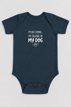 Lavender baby bodysuit with I'm Not Crying I'm Talking to My Dog print, snap closure