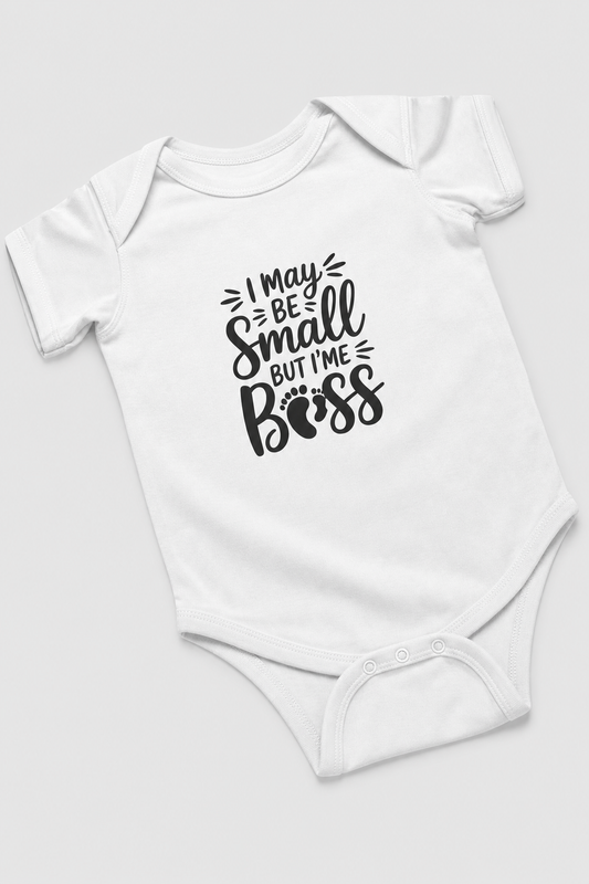 Baby wearing white I May Be Small But I'm Boss bodysuit, snap closure