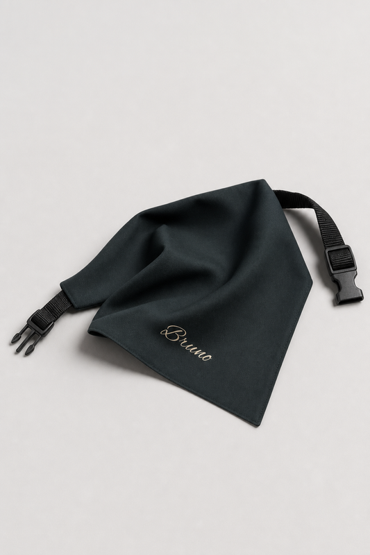 Black personalized dog bandana with custom name, adjustable neck strap