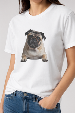 Person wearing a white t-shirt with a pug graphic on a plain background