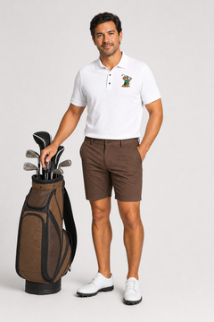 Man in golf attire with a golf bag on a light gray background