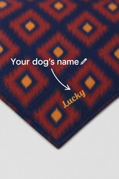 Diamond pattern custom name detail on red navy dog bandana