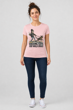 Woman wearing black Raising Kids and Wild Dogs t-shirt